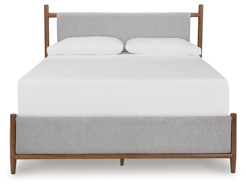 Lyncott California King Upholstered Bed with Mirrored Dresser